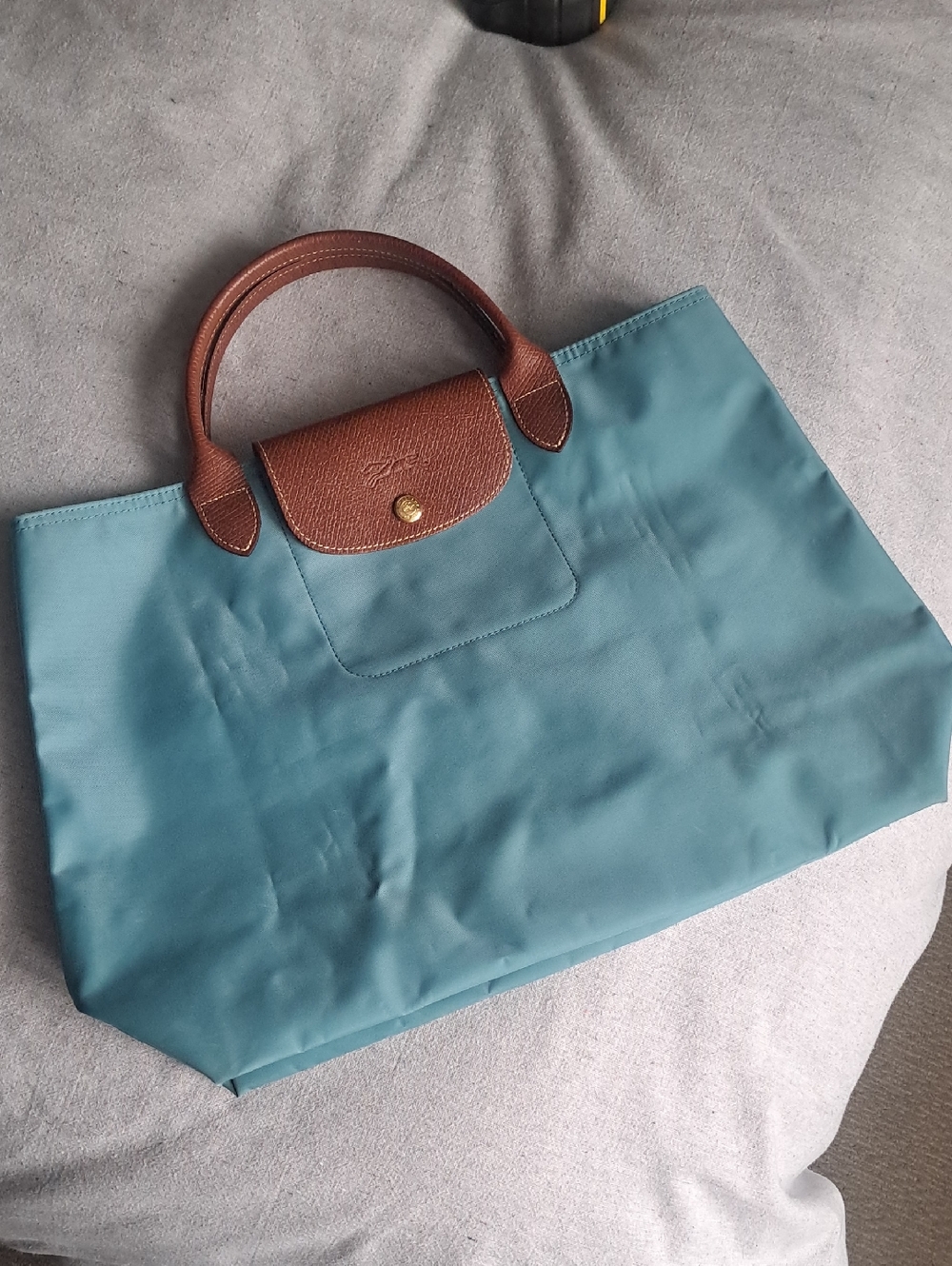 Longchamp Le Pliage "Cabas" teal nylon tote with brown leather trim